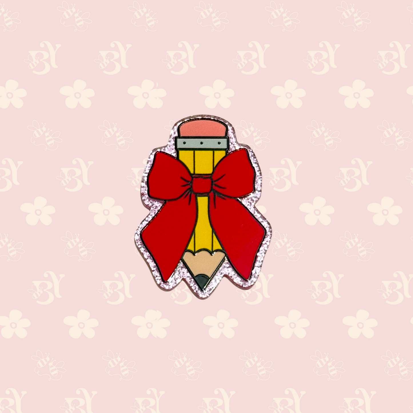 Pencil and red bow