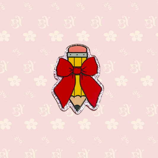 Pencil and red bow